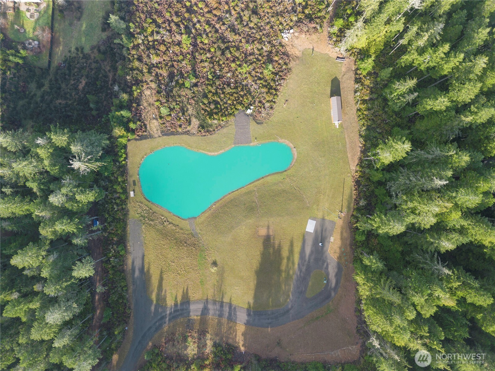 151 East Kingsley Place Belfair, WA 98528 - Photo 3 of 40 a view of a wooden floor