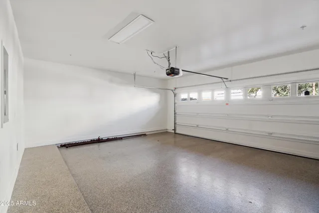 a view of a street with a building in the background