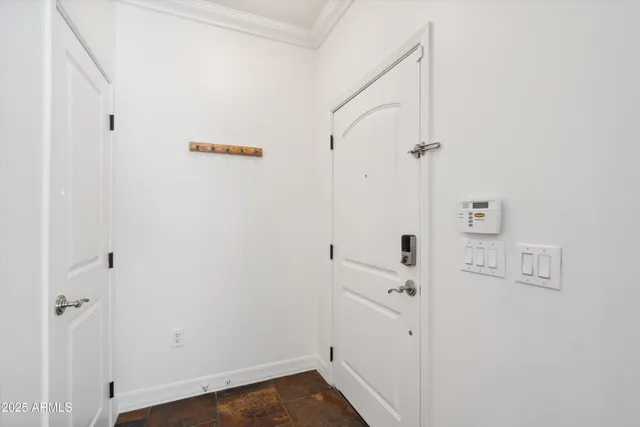 a view of a hallway with closet