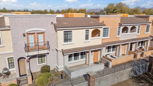 a front view of a house with glass windows