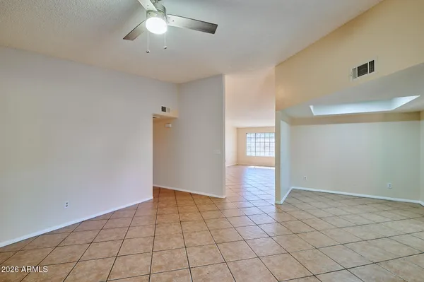 a view of an empty room and window