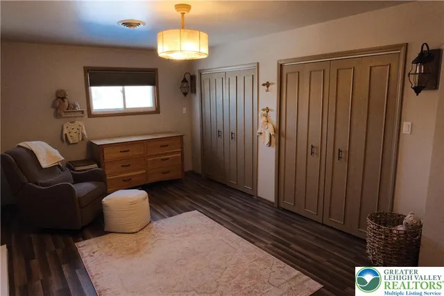 a bathroom with a sink a mirror and a shower