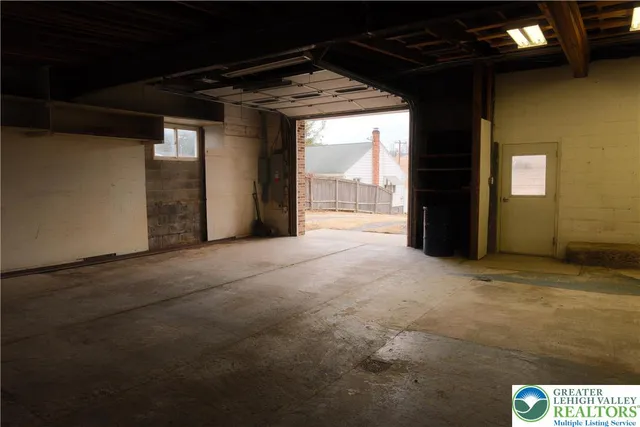 a white toilet sitting next to a shower curtain