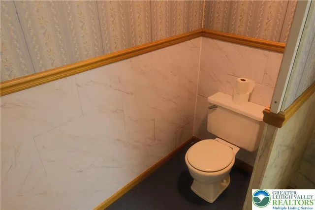 a view of balcony and floor with wooden floor