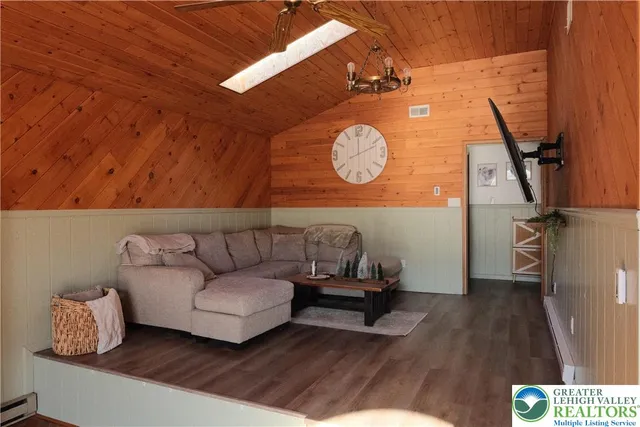 a living room with a couch and a table