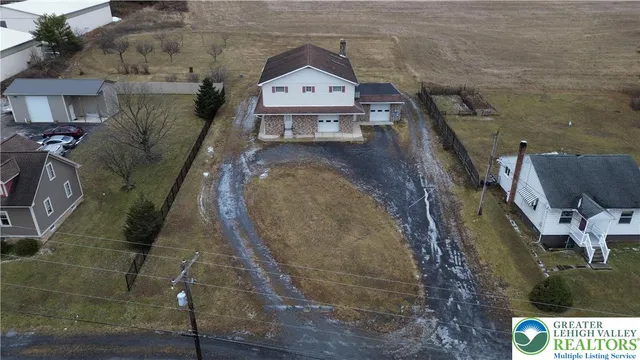a view of a backyard of a house
