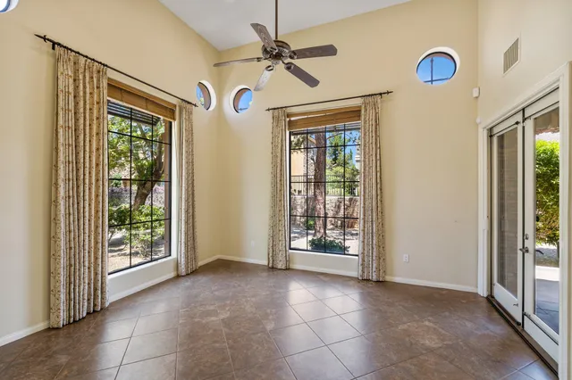 a view of a hallway with a chandelier