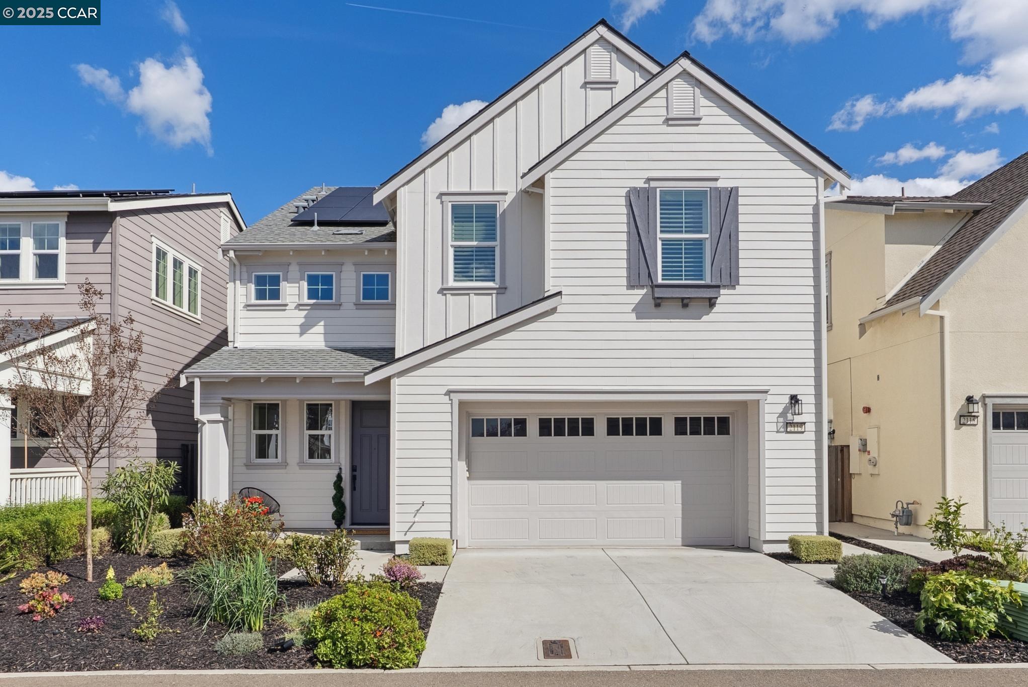 a front view of a white building