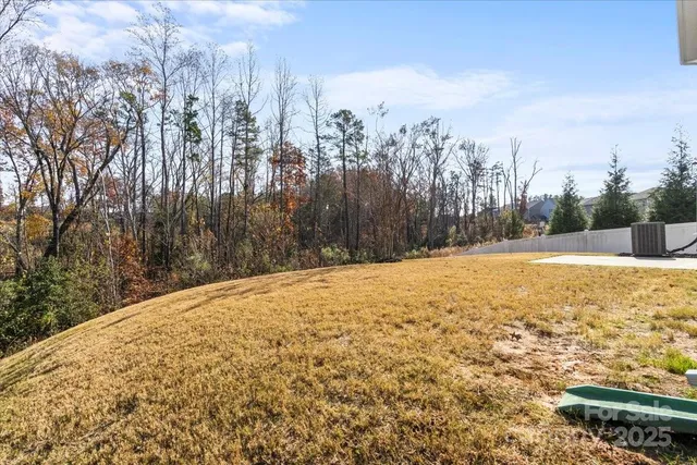 a view of large yard and covered with snow