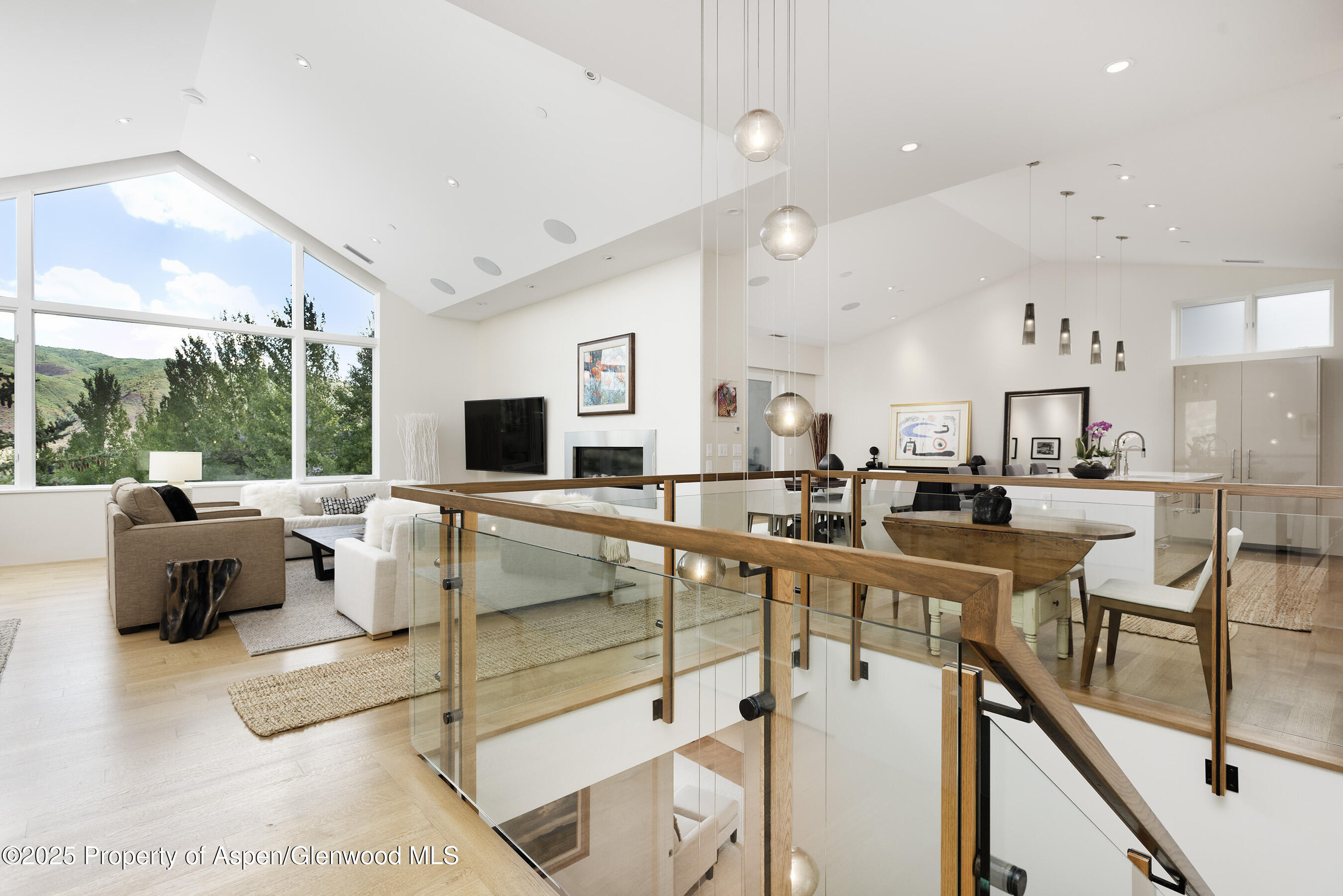 751 Promontory Lane Basalt, CO 81621 - Photo 2 of 41 a living room with furniture and a flat screen tv