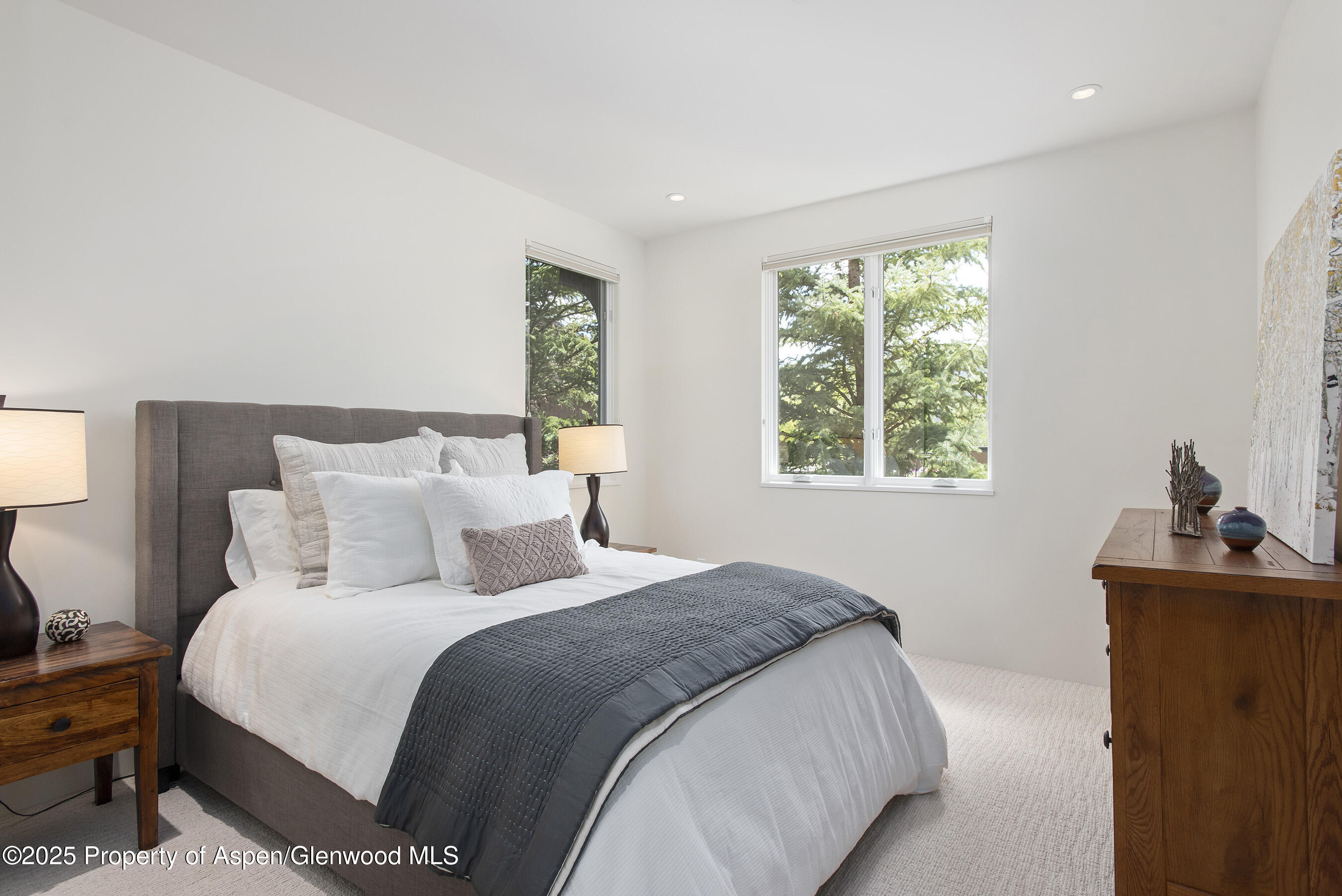 751 Promontory Lane Basalt, CO 81621 - Photo 21 of 41 a bedroom with bed and window