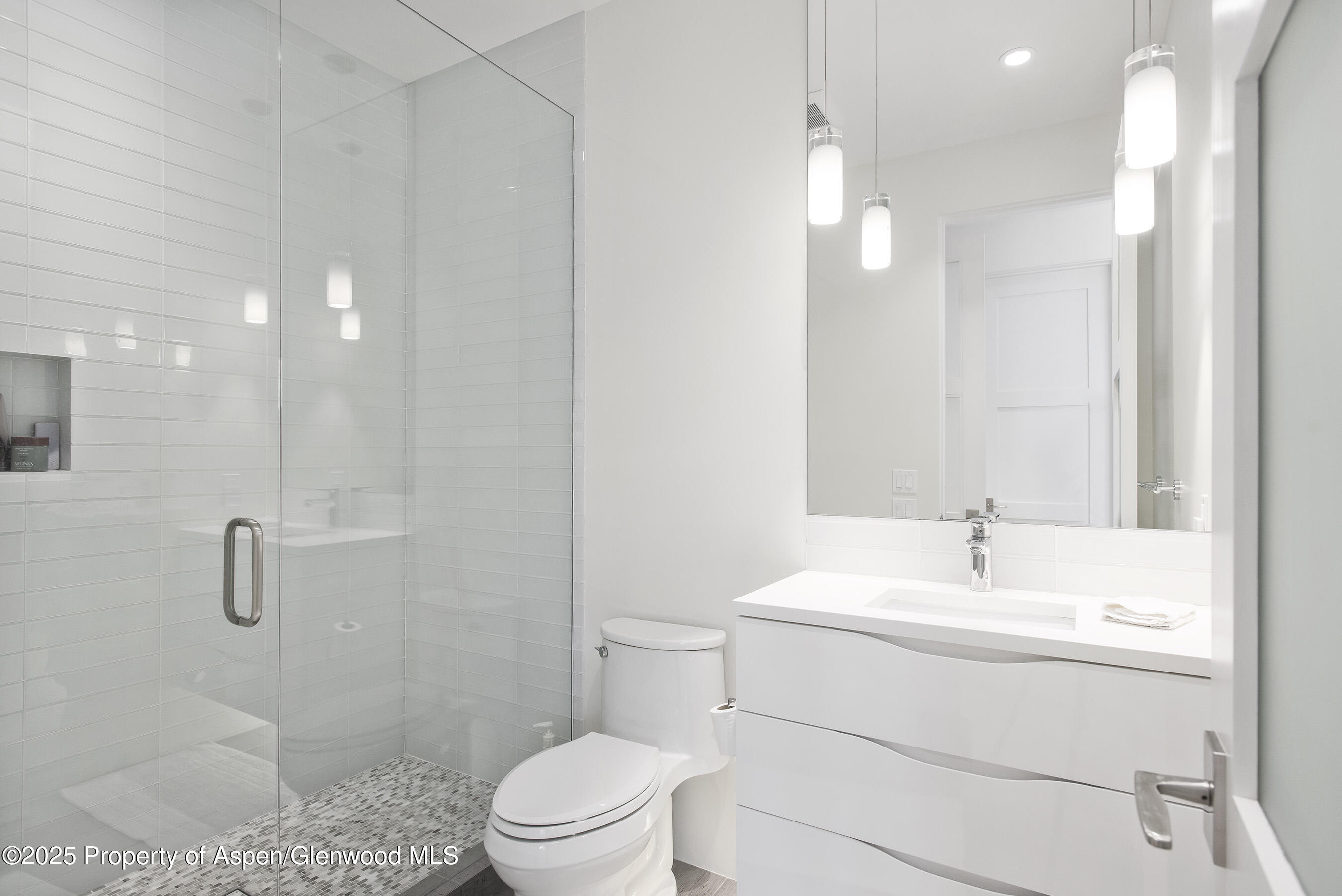 751 Promontory Lane Basalt, CO 81621 - Photo 22 of 41 a bathroom with a sink a toilet and shower