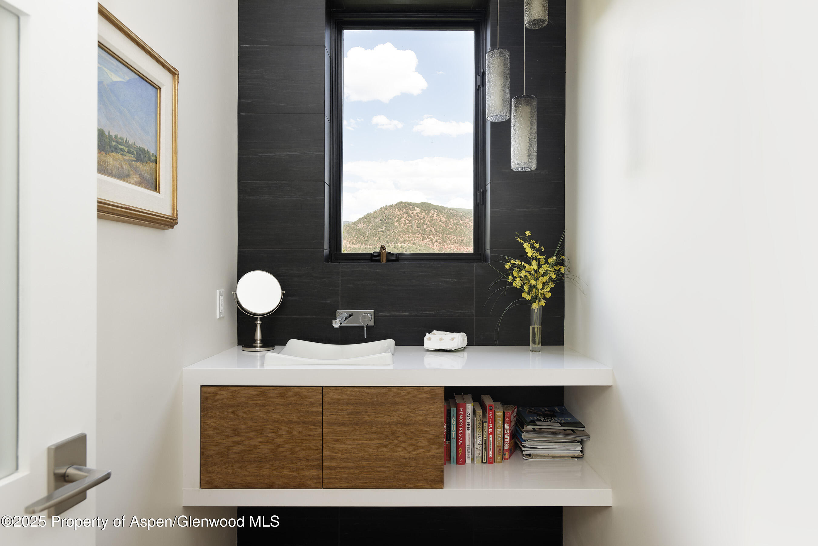 751 Promontory Lane Basalt, CO 81621 - Photo 25 of 41 a view of bathroom with a sink and a window