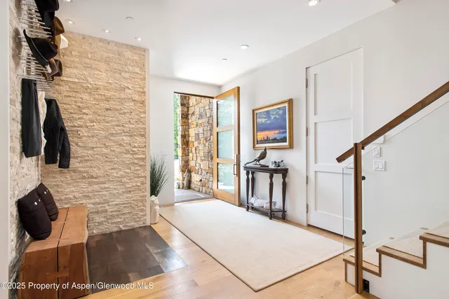 a view of a livingroom with furniture workspace and a window