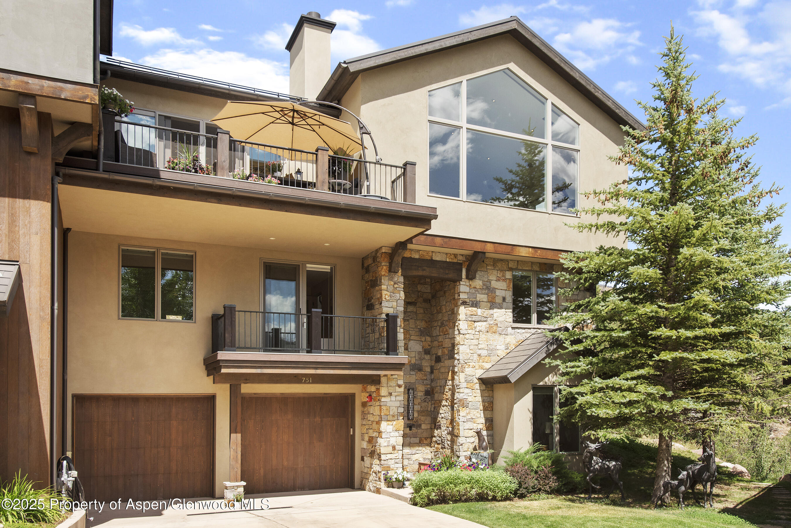 751 Promontory Lane Basalt, CO 81621 - Photo 29 of 41 a front view of a house with a yard