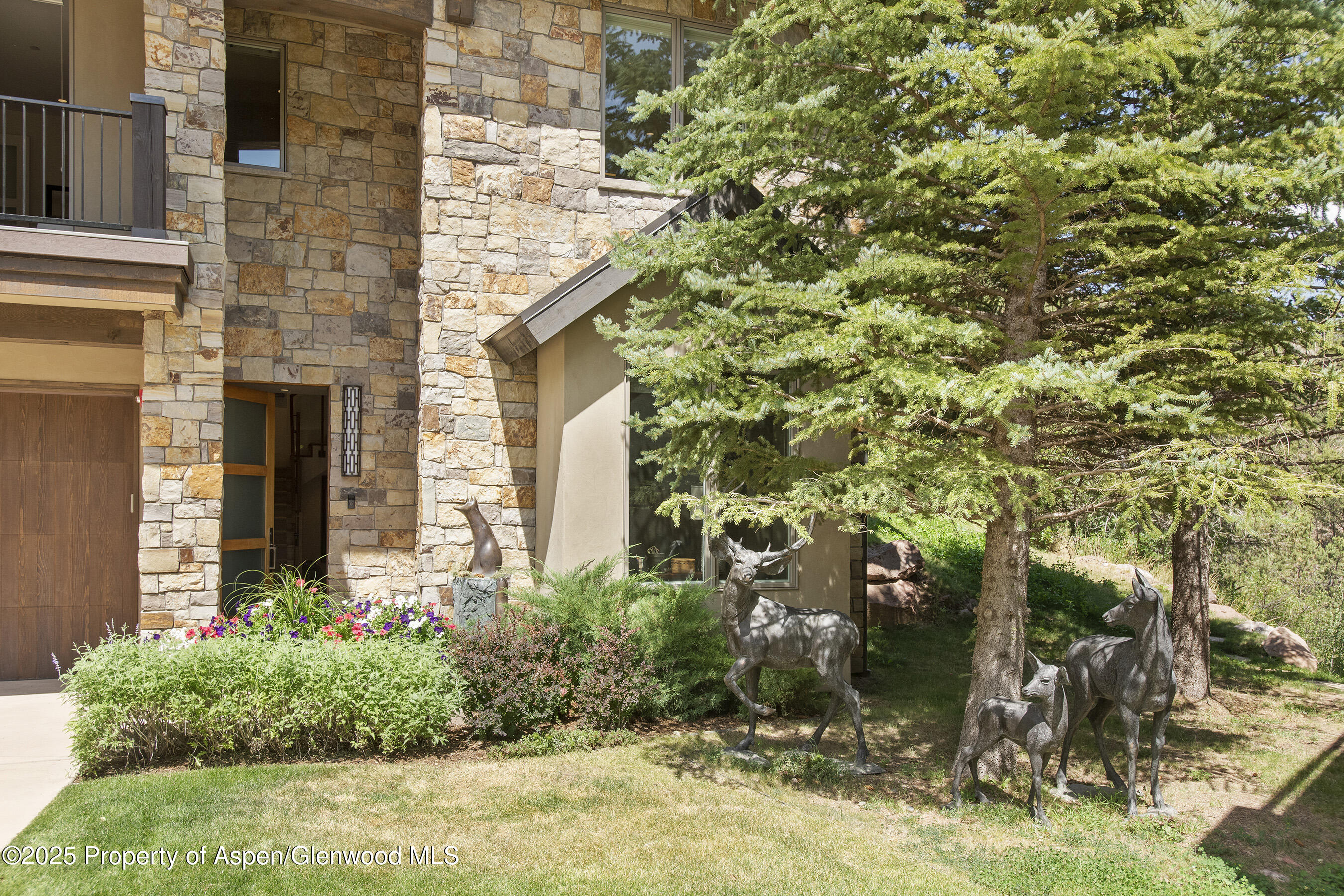 751 Promontory Lane Basalt, CO 81621 - Photo 30 of 41 a front view of a house with a yard