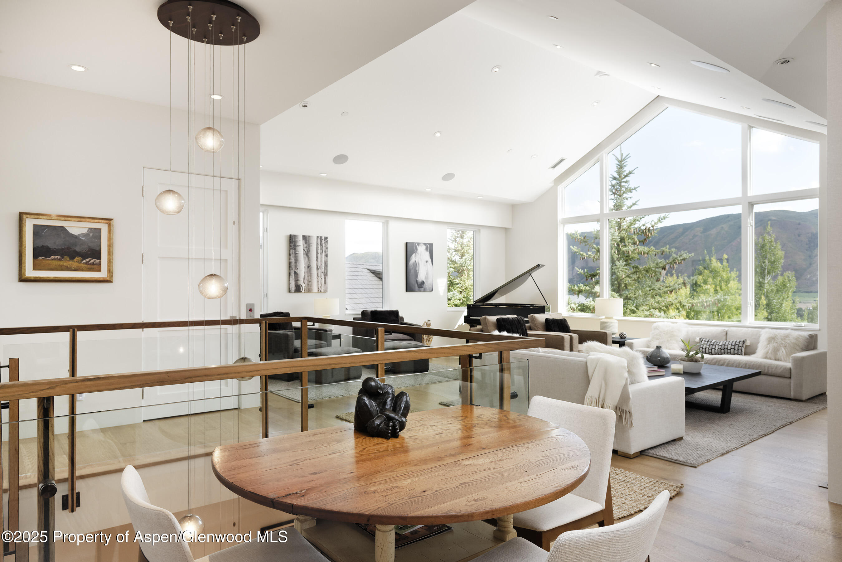 751 Promontory Lane Basalt, CO 81621 - Photo 8 of 41 a living room with furniture and a large window