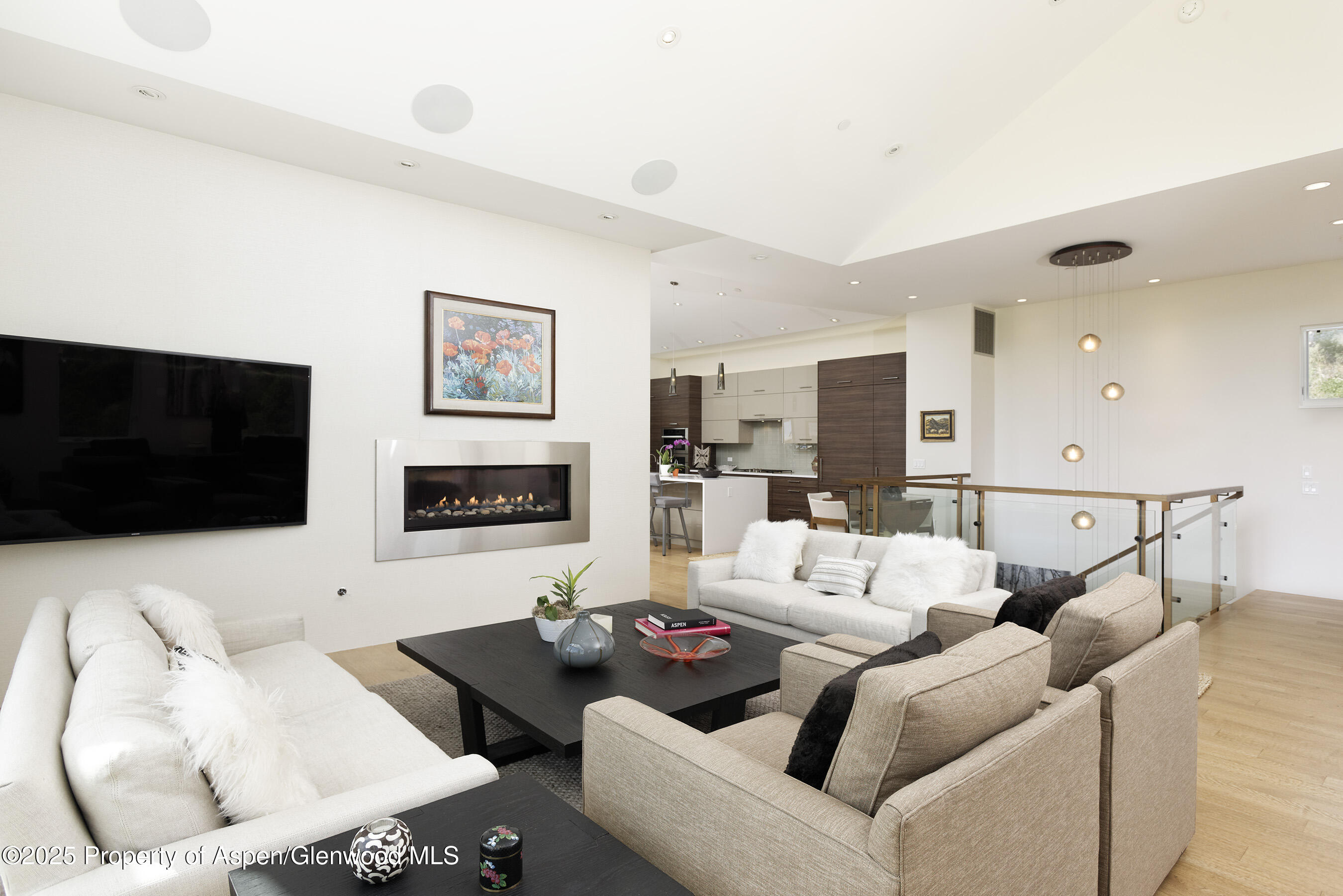 751 Promontory Lane Basalt, CO 81621 - Photo 9 of 41 a living room with furniture and a flat screen tv