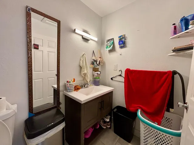a bathroom with a tub and shower