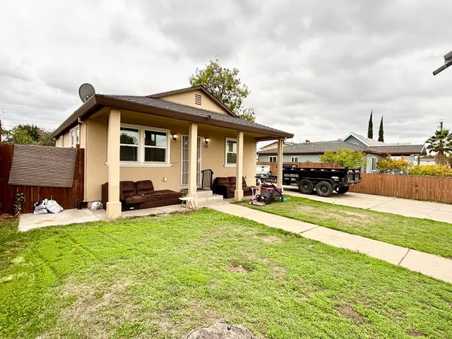 a car parked in front of a house