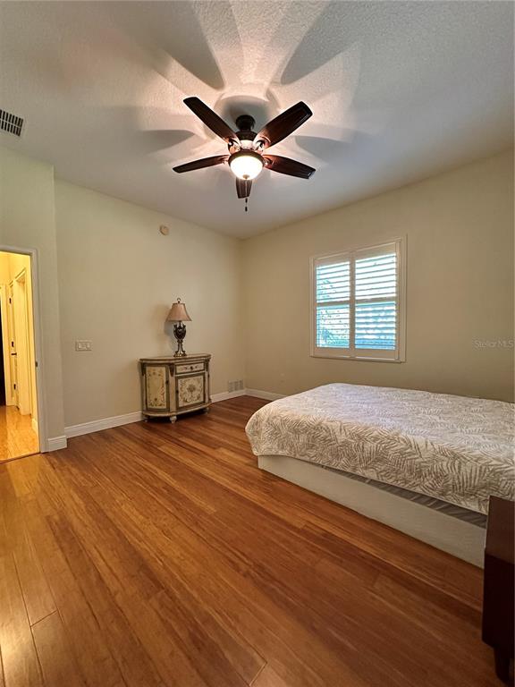 8209 Southwest 196th Ct Road Dunnellon, FL 34432 - Photo 16 of 29 a bedroom with a bed and a window