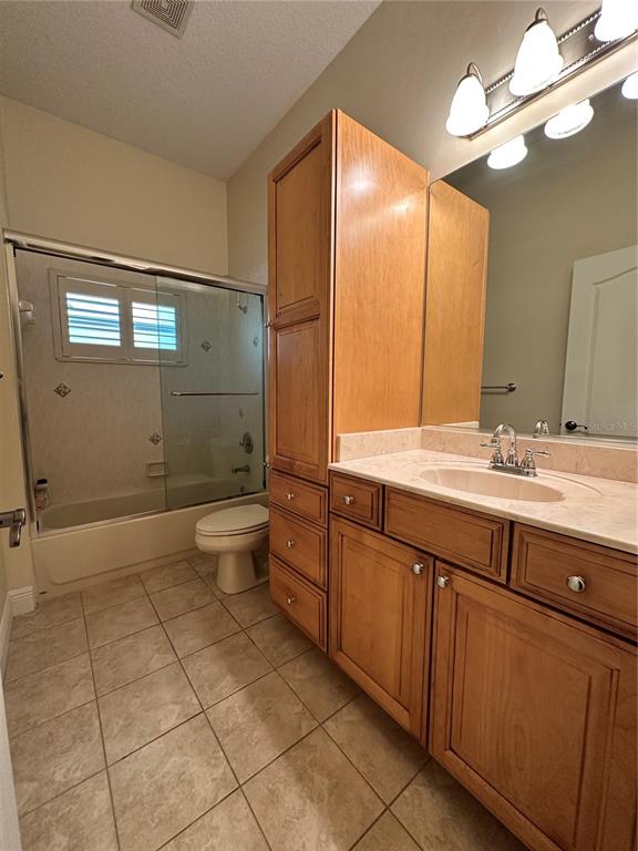 8209 Southwest 196th Ct Road Dunnellon, FL 34432 - Photo 17 of 29 a bathroom with a double vanity sink and a mirror