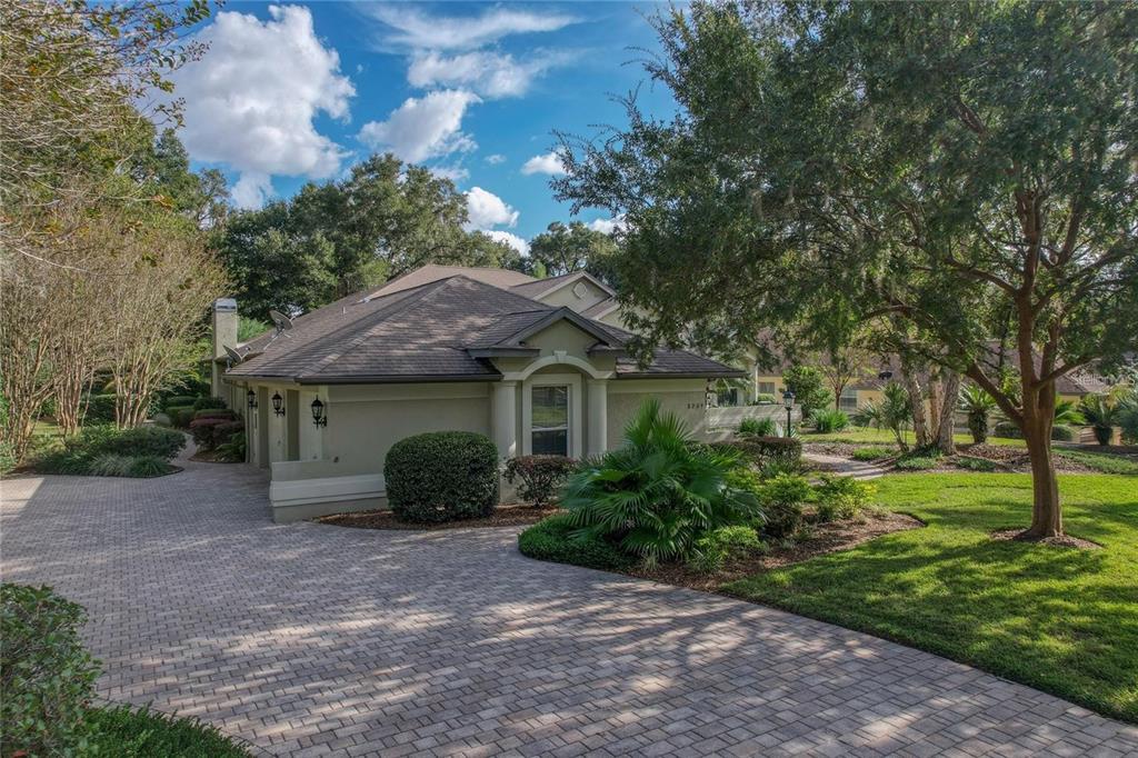 8209 Southwest 196th Ct Road Dunnellon, FL 34432 - Photo 26 of 29 a view of a house with backyard and garden