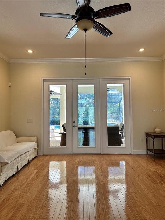 8209 Southwest 196th Ct Road Dunnellon, FL 34432 - Photo 7 of 29 a living room with furniture and a large window
