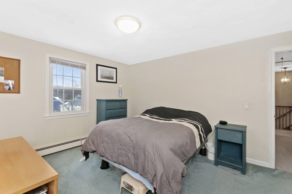 17 Nardone Road Needham, MA 02492 - Photo 15 of 22 a bedroom with a bed and a window