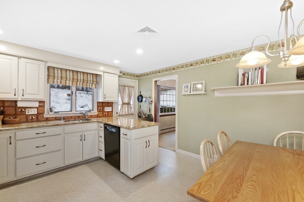17 Nardone Road Needham, MA 02492 - Photo 2 of 22 a kitchen with a sink and cabinets