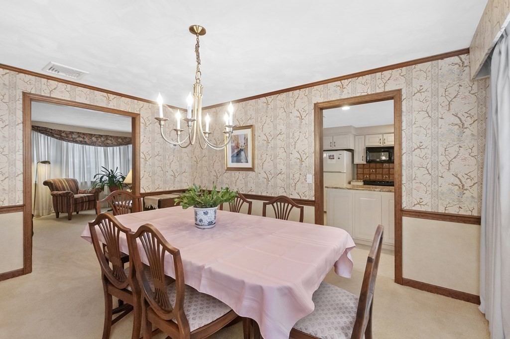 17 Nardone Road Needham, MA 02492 - Photo 8 of 22 a view of a dining room with furniture