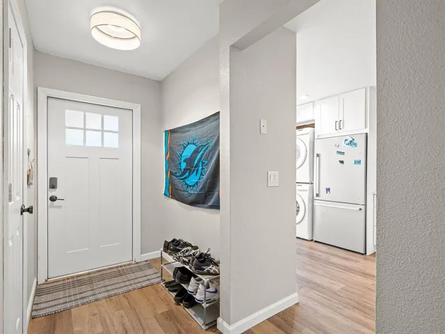 a view of a livingroom with wooden floor