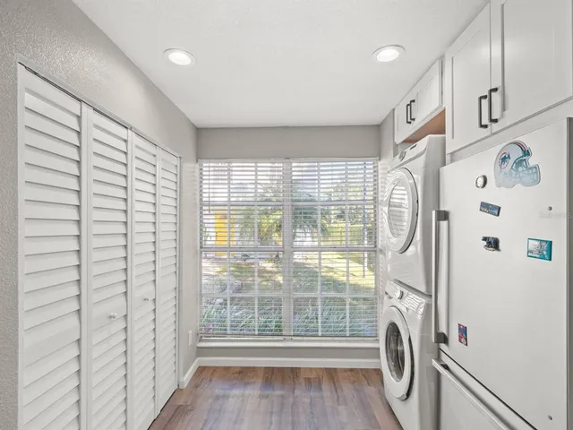 a view of utility room with windows
