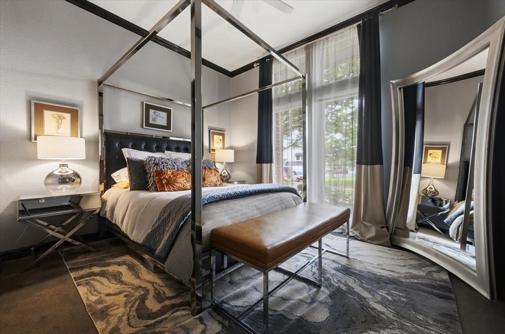 308 North Broadway Road Azle, TX 76020 - Photo 24 of 31 The bedroom features a canopy bed frame, a decorative area rug, and full-height windows with curtains