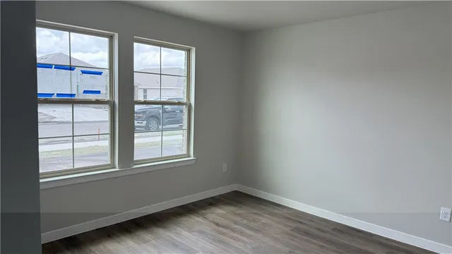 an empty room with windows