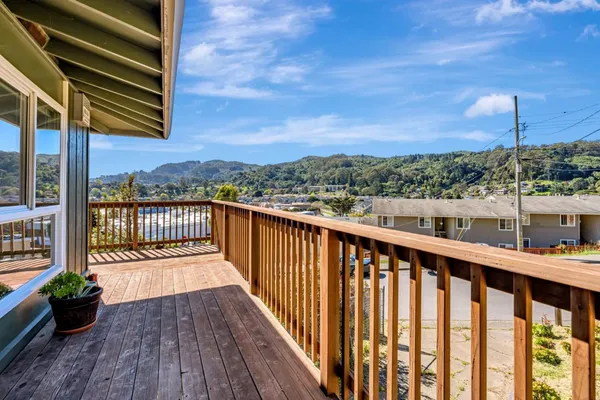 a view of a two chairs with wooden floor