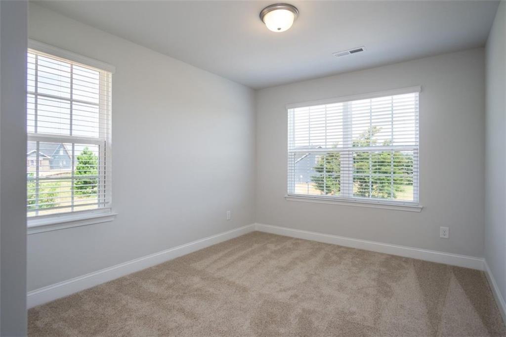 668 Bald Ridge Circle Demorest, GA 30535 - Photo 18 of 21 an empty room with a window