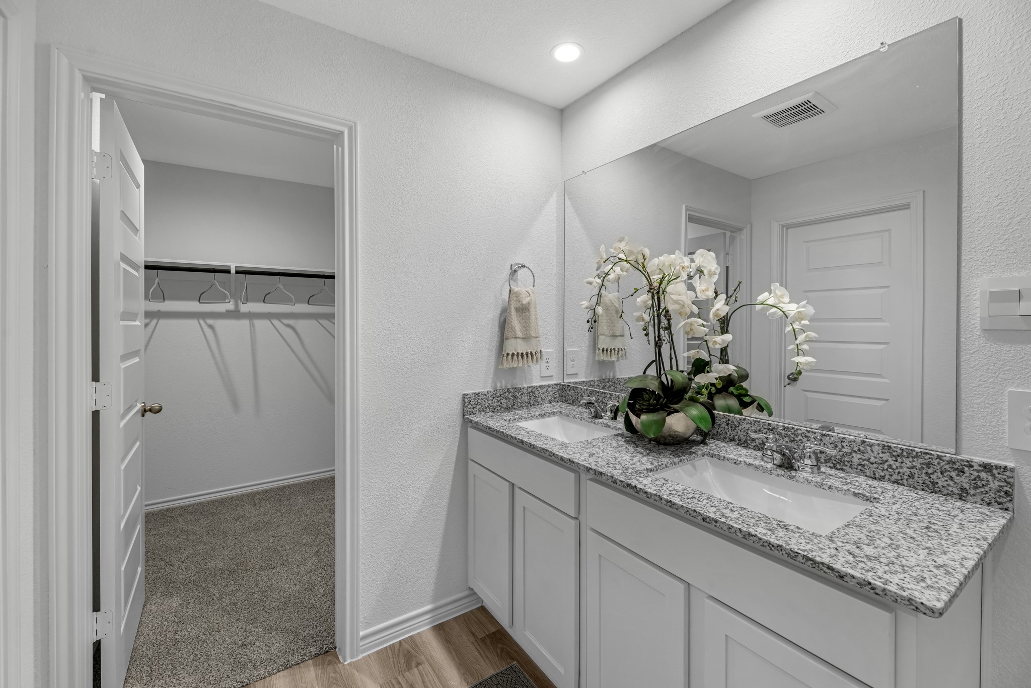 5655 Spoonbill Lane Orange, TX 77632 - Photo 19 of 23 a bathroom with a granite countertop sink and a mirror