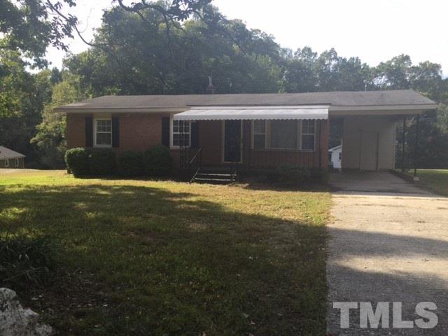 800 Friar Tuck Road Raleigh, NC 27610 - Photo 1 of 18 a view of house with yard