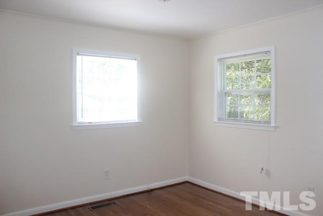 800 Friar Tuck Road Raleigh, NC 27610 - Photo 11 of 18 an empty room with a window