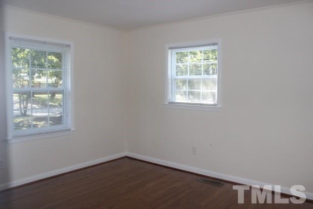 800 Friar Tuck Road Raleigh, NC 27610 - Photo 14 of 18 an empty room with a window