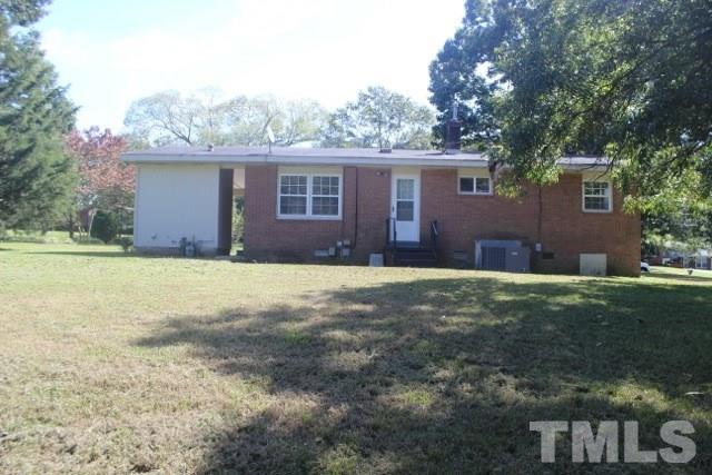 800 Friar Tuck Road Raleigh, NC 27610 - Photo 16 of 18 front view of a house with a yard