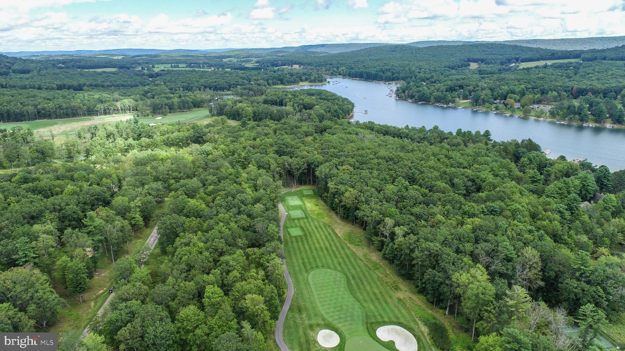 0 Crows Point Road Swanton, MD 21561 - Photo 11 of 15 a view of a green yard with an outdoor seating