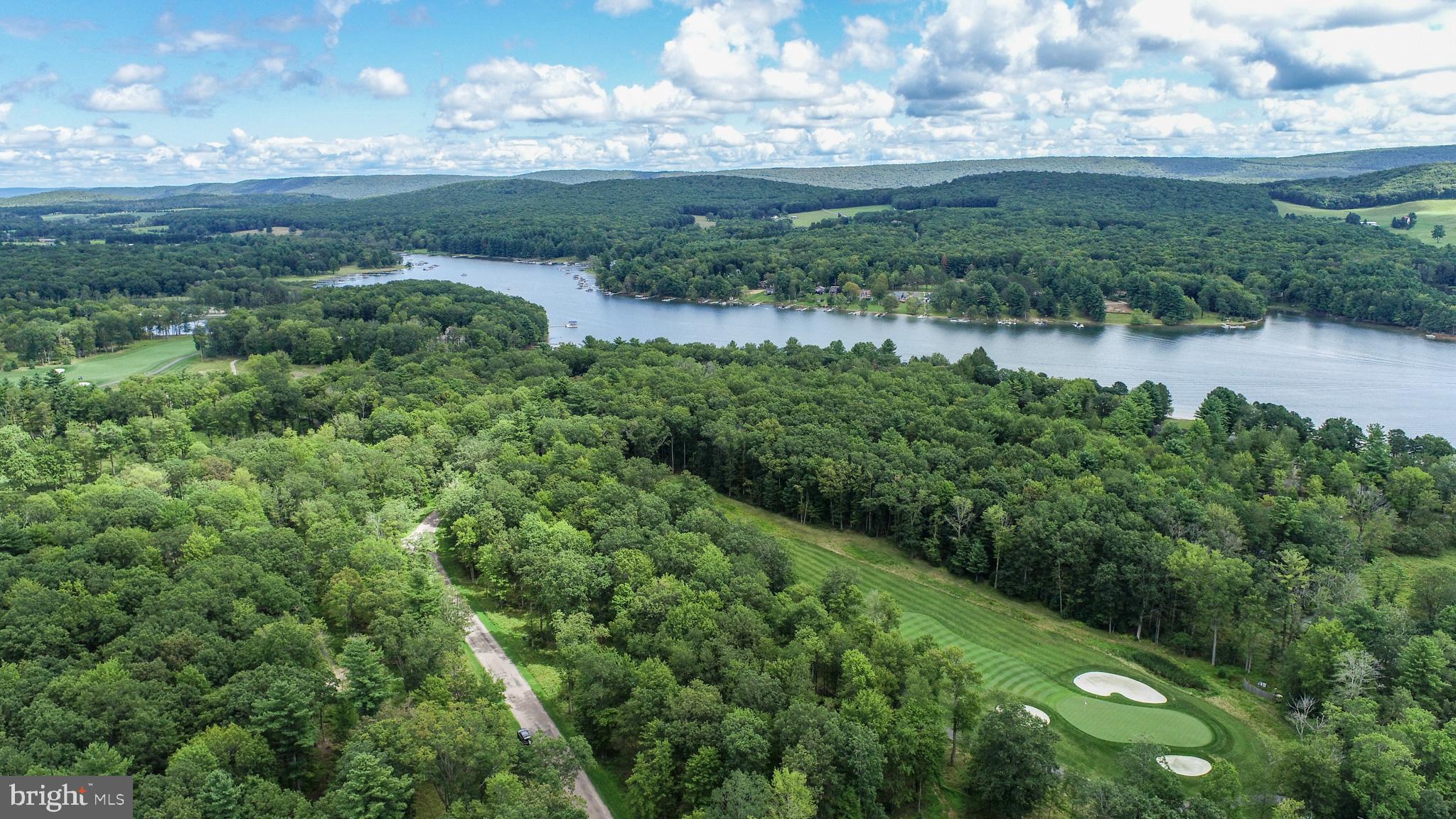 0 Crows Point Road Swanton, MD 21561 - Photo 12 of 15 a view of a lake with a city