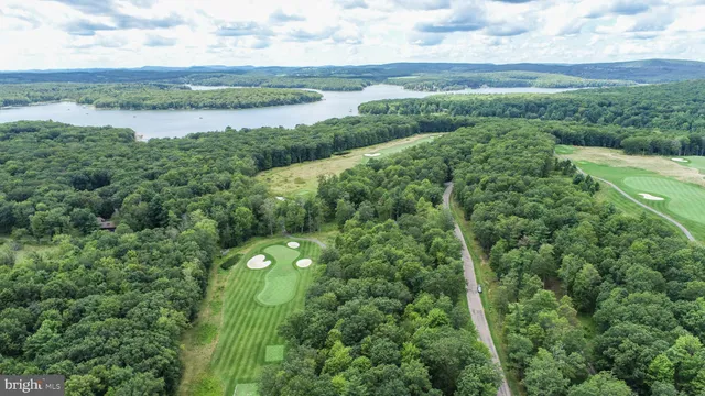 a view of a lake with a yard
