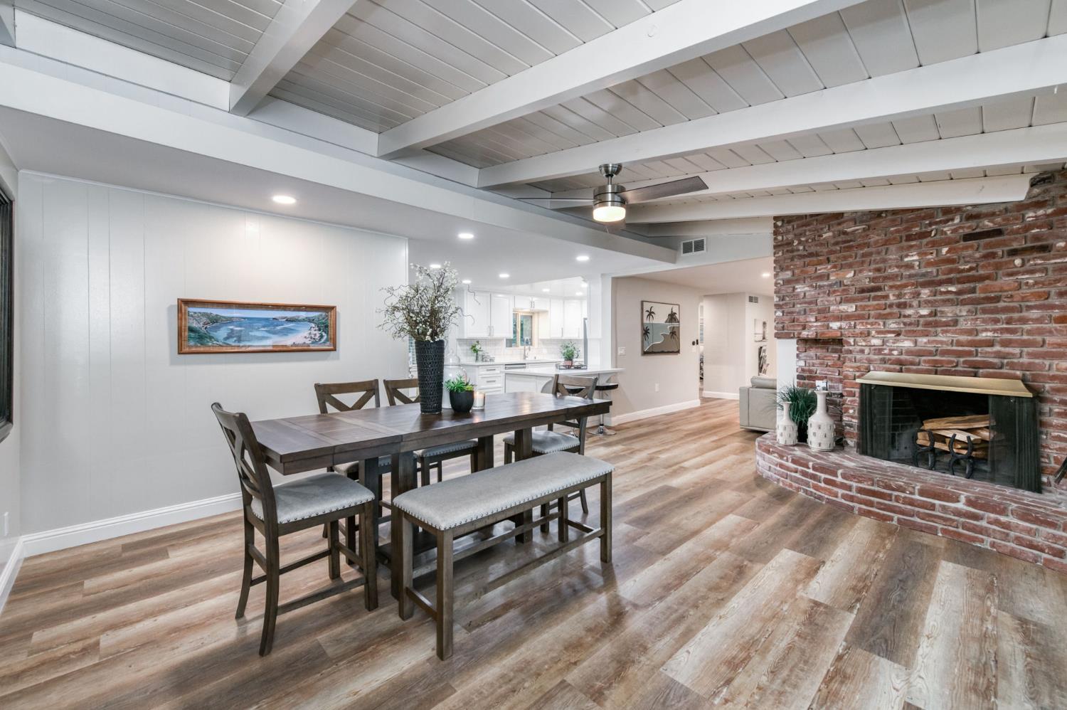 1540 West San Ramon Avenue Fresno, CA 93711 - Photo 11 of 32 a view of a livingroom with furniture and a fireplace