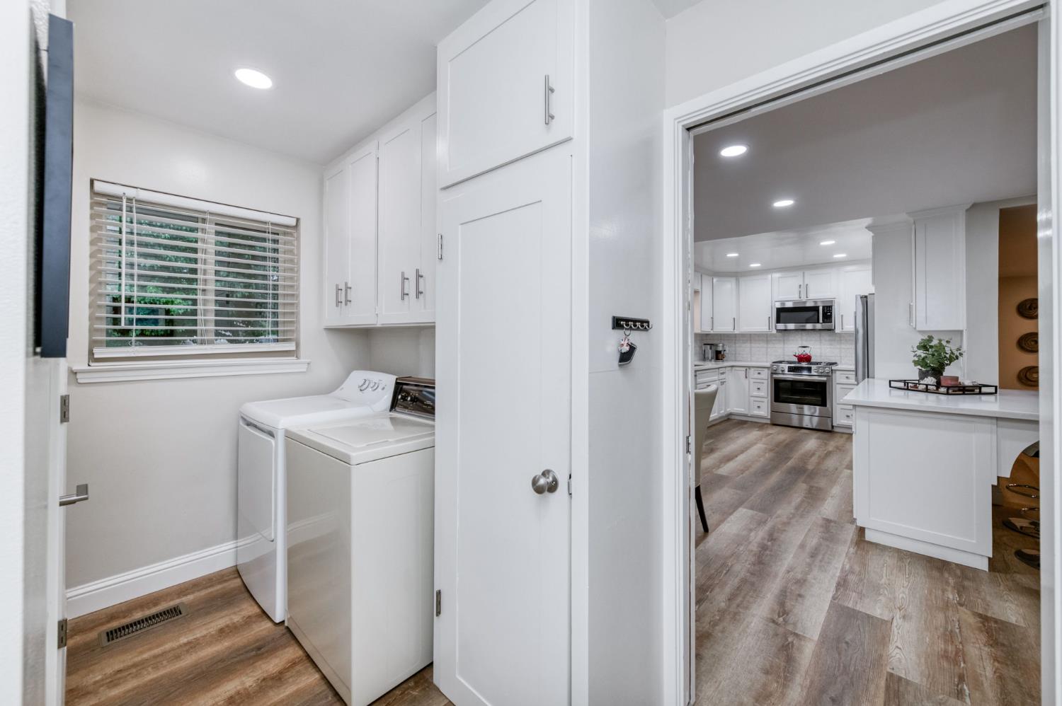 1540 West San Ramon Avenue Fresno, CA 93711 - Photo 19 of 32 a view of kitchen with sink and refrigerator