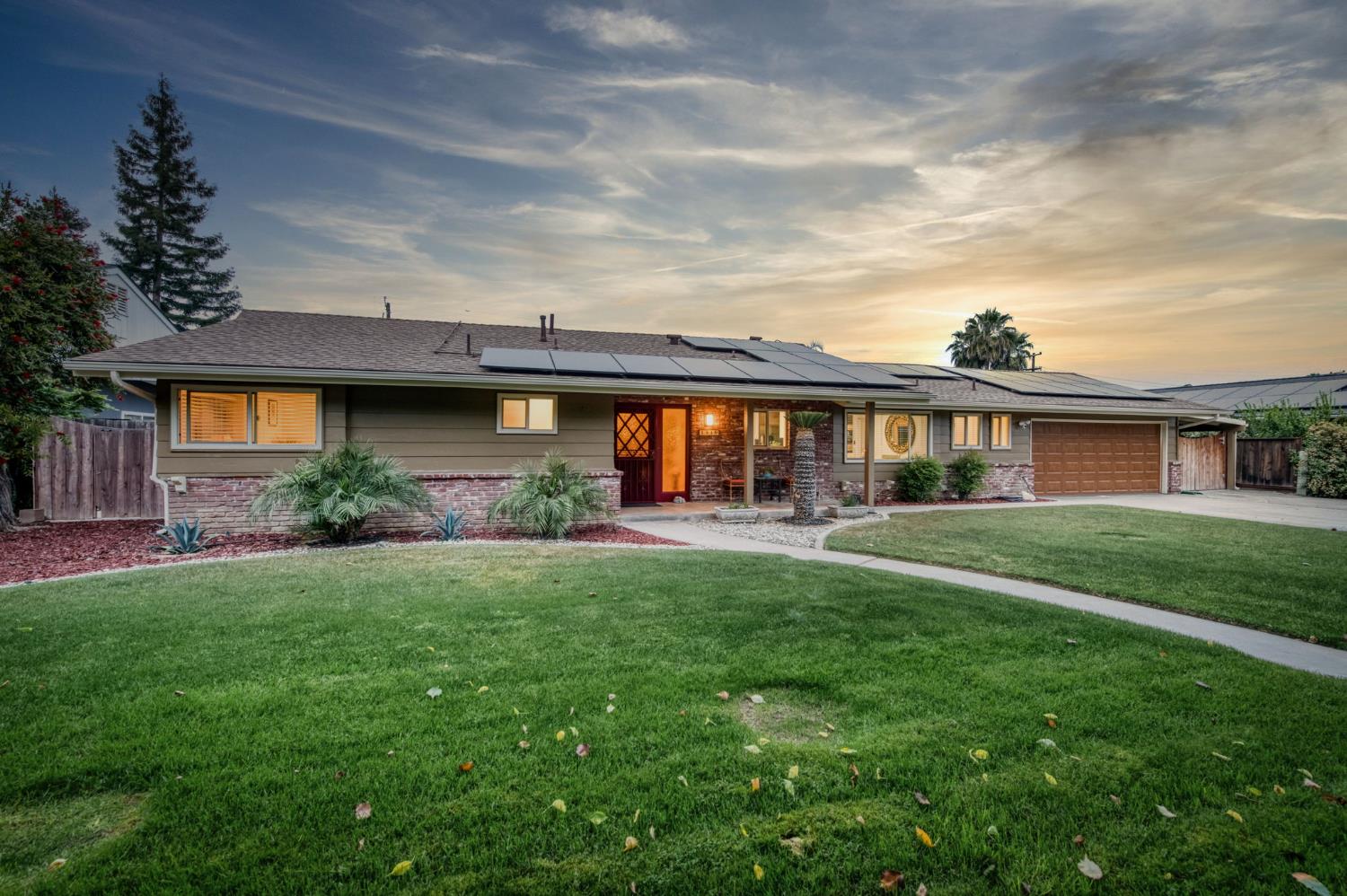 1540 West San Ramon Avenue Fresno, CA 93711 - Photo 2 of 32 front view of a house with a yard