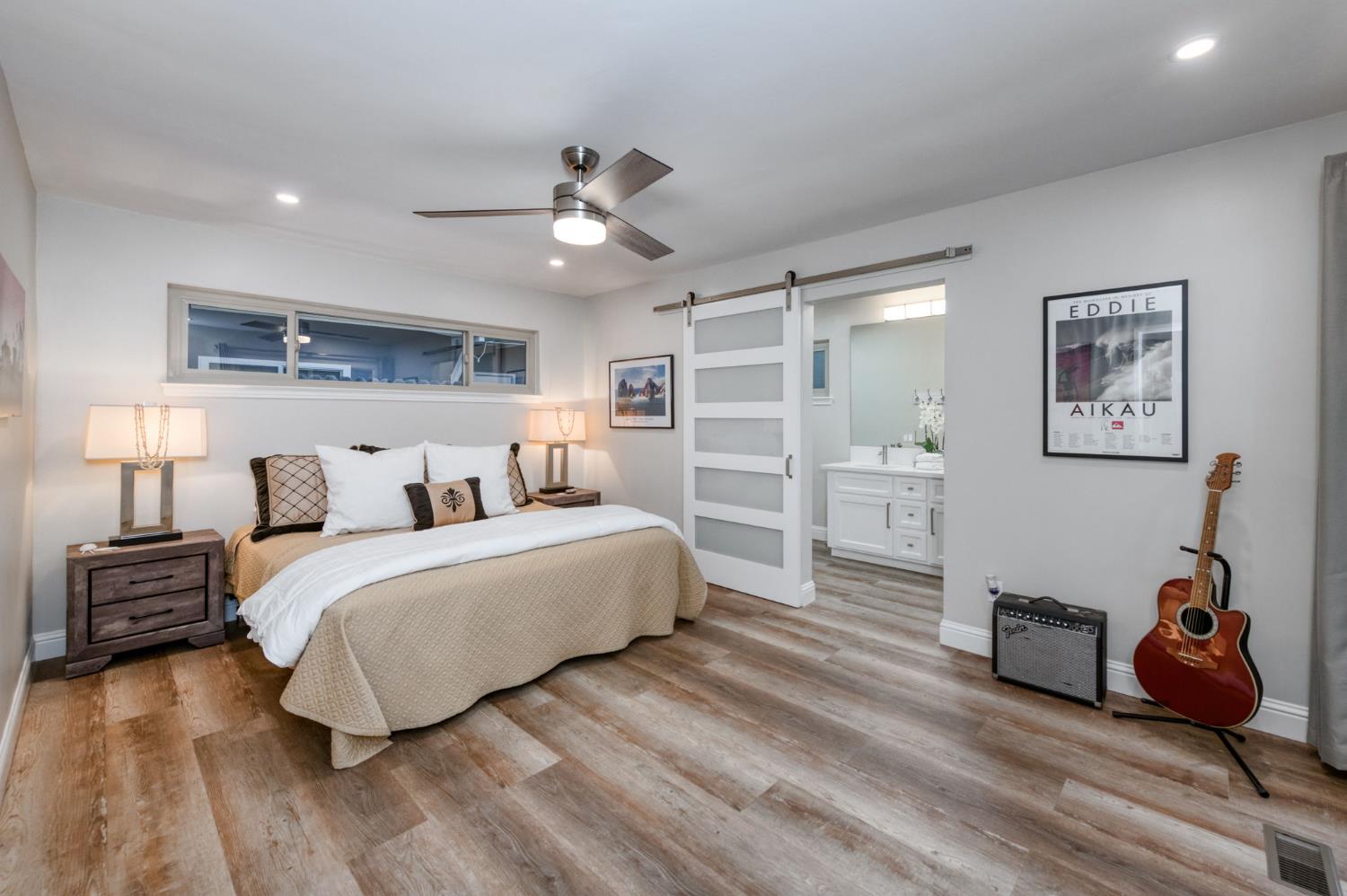 1540 West San Ramon Avenue Fresno, CA 93711 - Photo 22 of 32 a spacious bedroom with a bed and closet