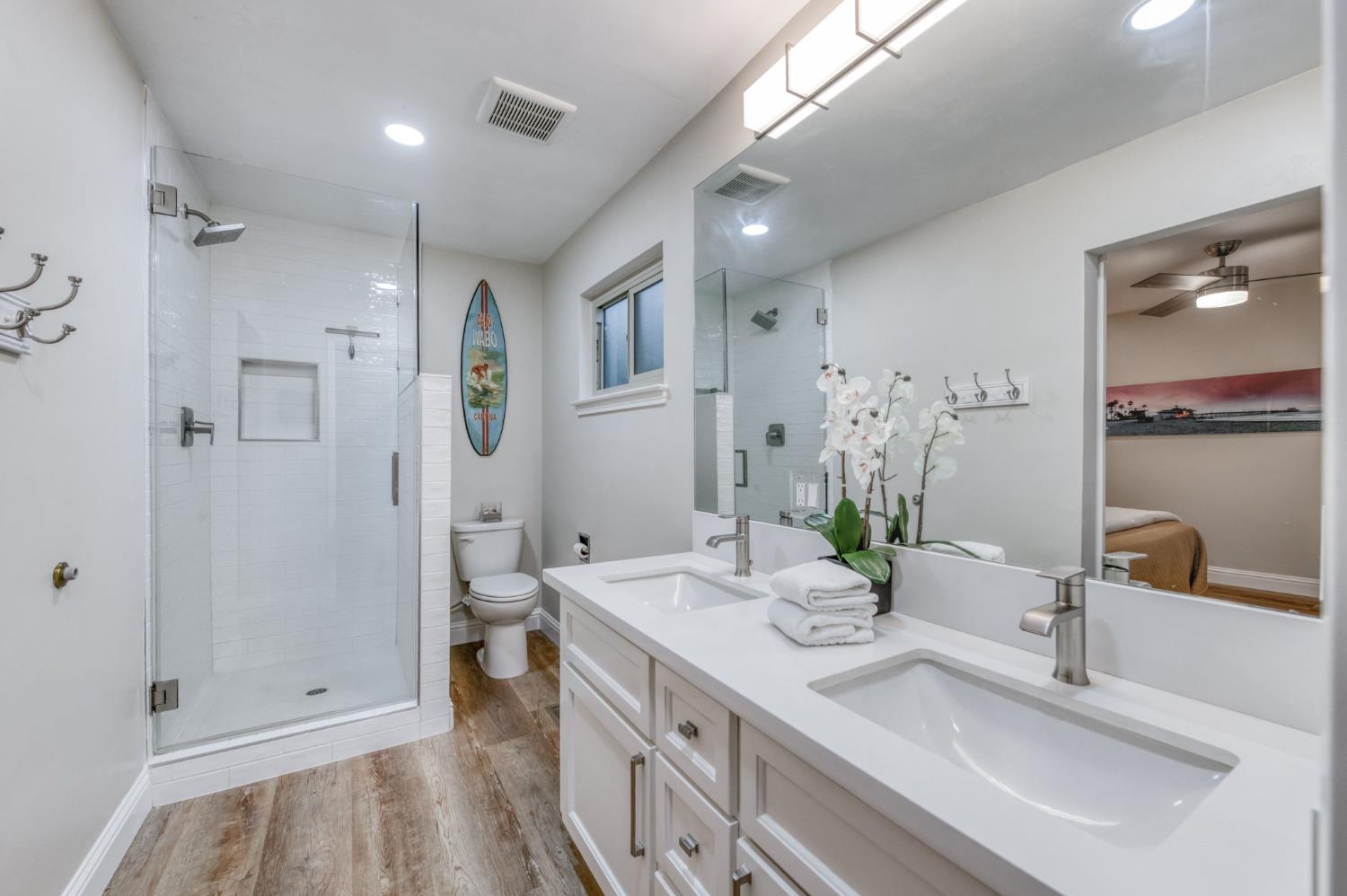 1540 West San Ramon Avenue Fresno, CA 93711 - Photo 24 of 32 a bathroom with a sink a toilet and shower